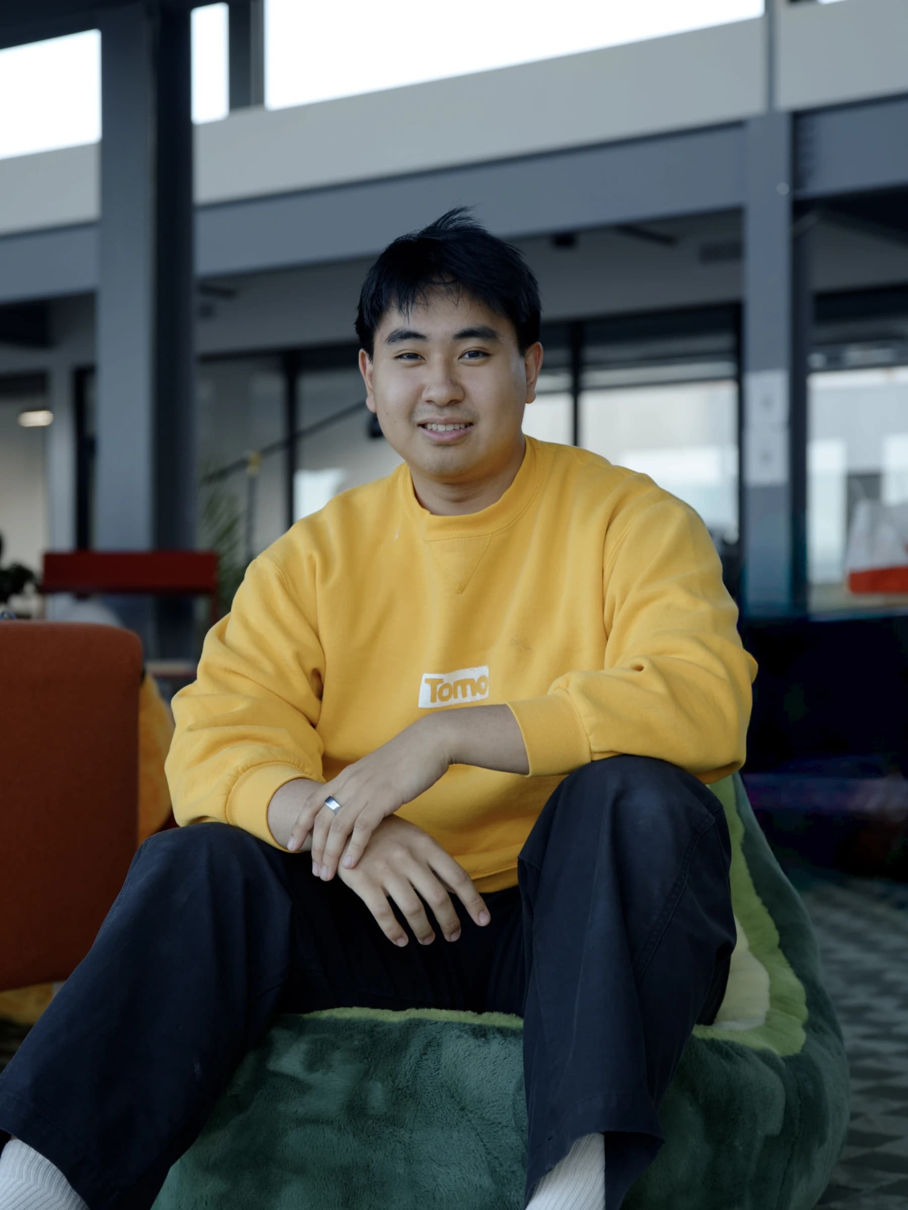 Team member relaxing on a beanbag