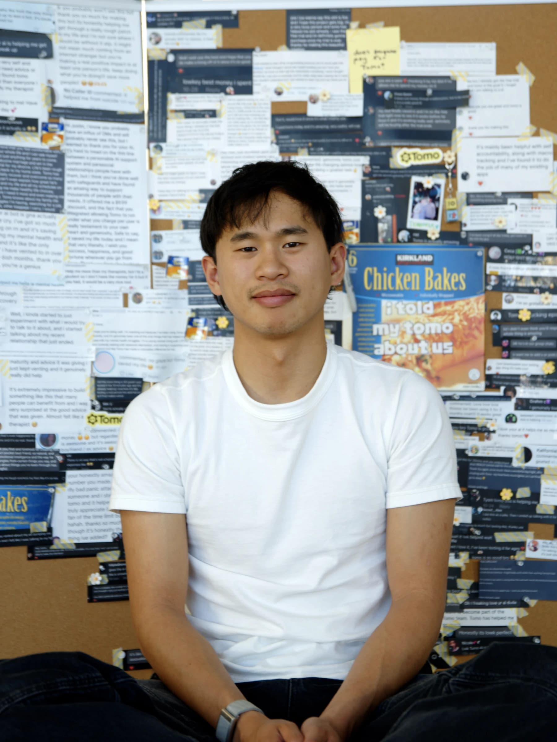 Team member at the Tomo love wall